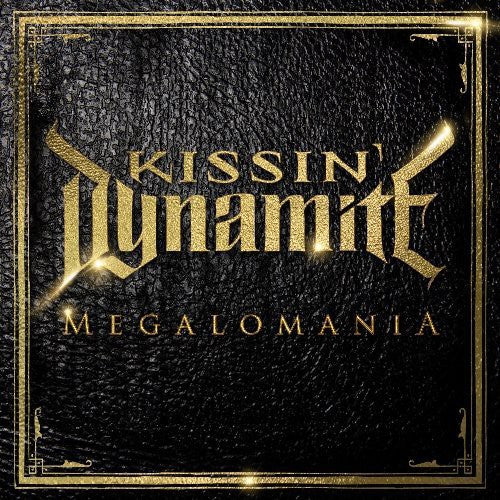 the album cover for Kissin' Dynamite - Megalomania