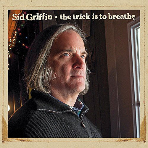 the album cover for Sid Griffin - Trick Is to Breathe