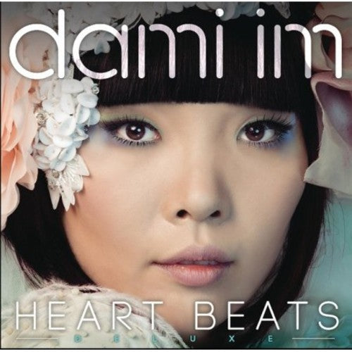 the album cover for Dami Im - Heart Beats: Deluxe Edition