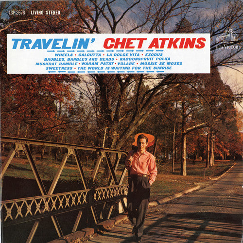 the album cover for Chet Atkins - Travelin