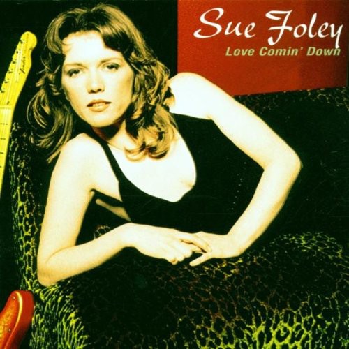 the album cover for Sue Foley - Love Comin' Down
