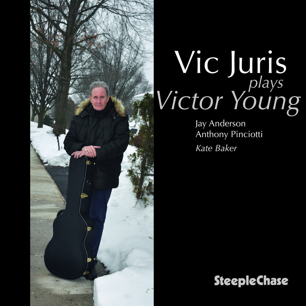the album cover for Vic Juris - Vic Plays Victor Young