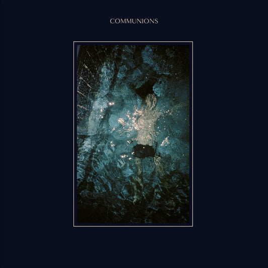 the album cover for Communions - Blue