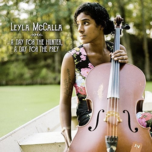 the album cover for Leyla McCalla - A Day For The Hunter, A Day For The Prey