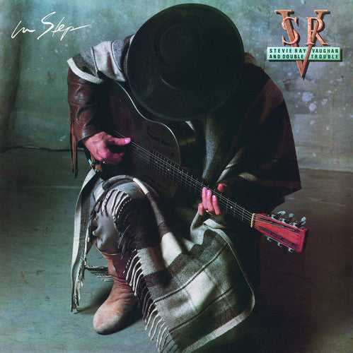 the album cover for Stevie Vaughn Ray - In Step (Hol)