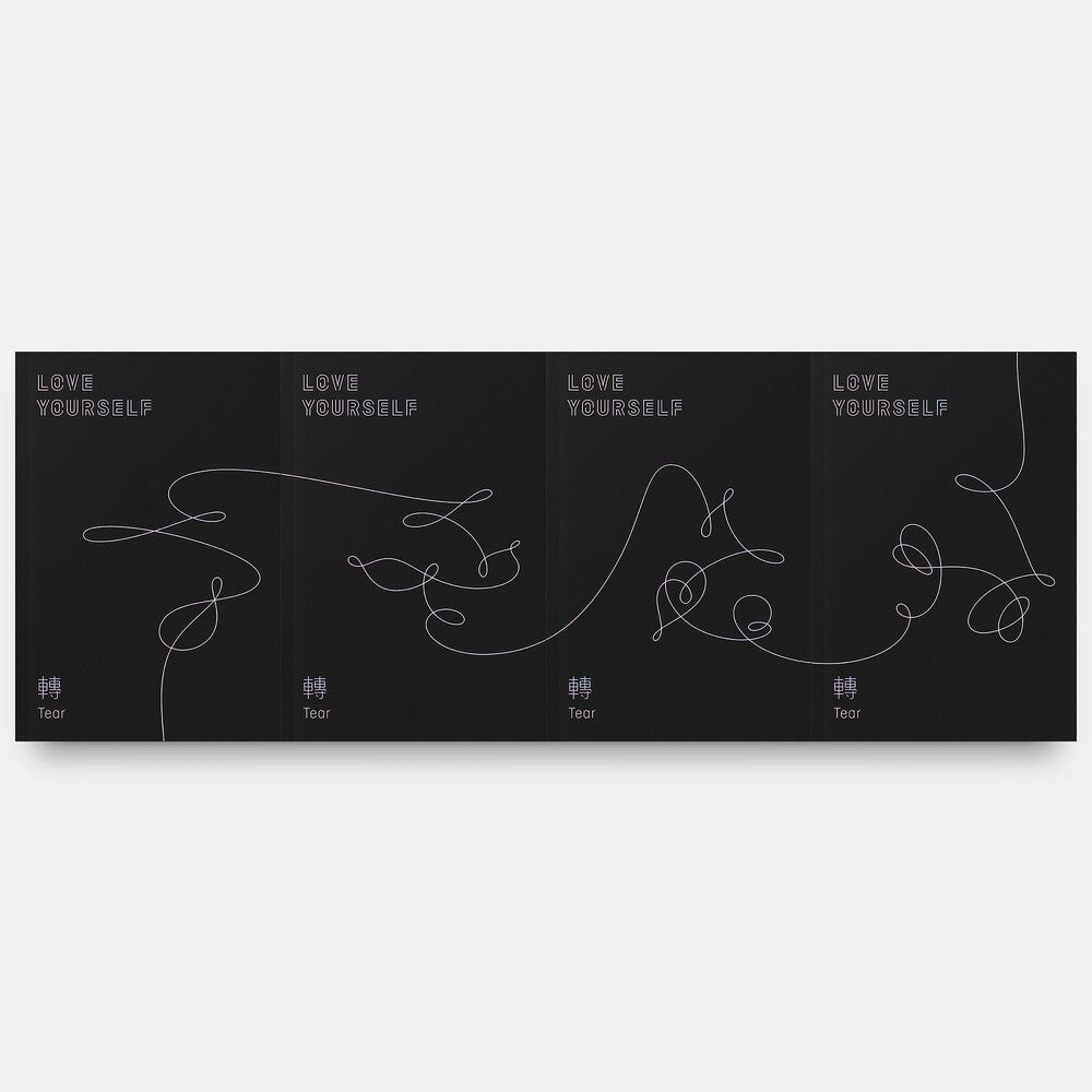 the album cover for BTS - Love Yourself: Tear (Random cover, incl. 104-page photobook, one random photocard, 20-page minibook and one standing photo)