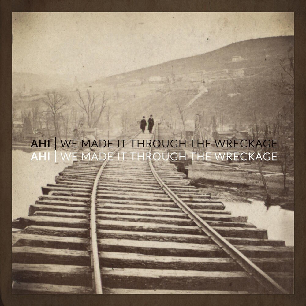 the album cover for AHI - We Made It Through The Wreckage