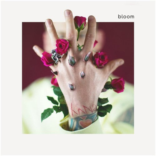 the album cover for mgk - Bloom