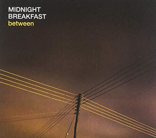 the album cover for Midnight Breakfast - Between