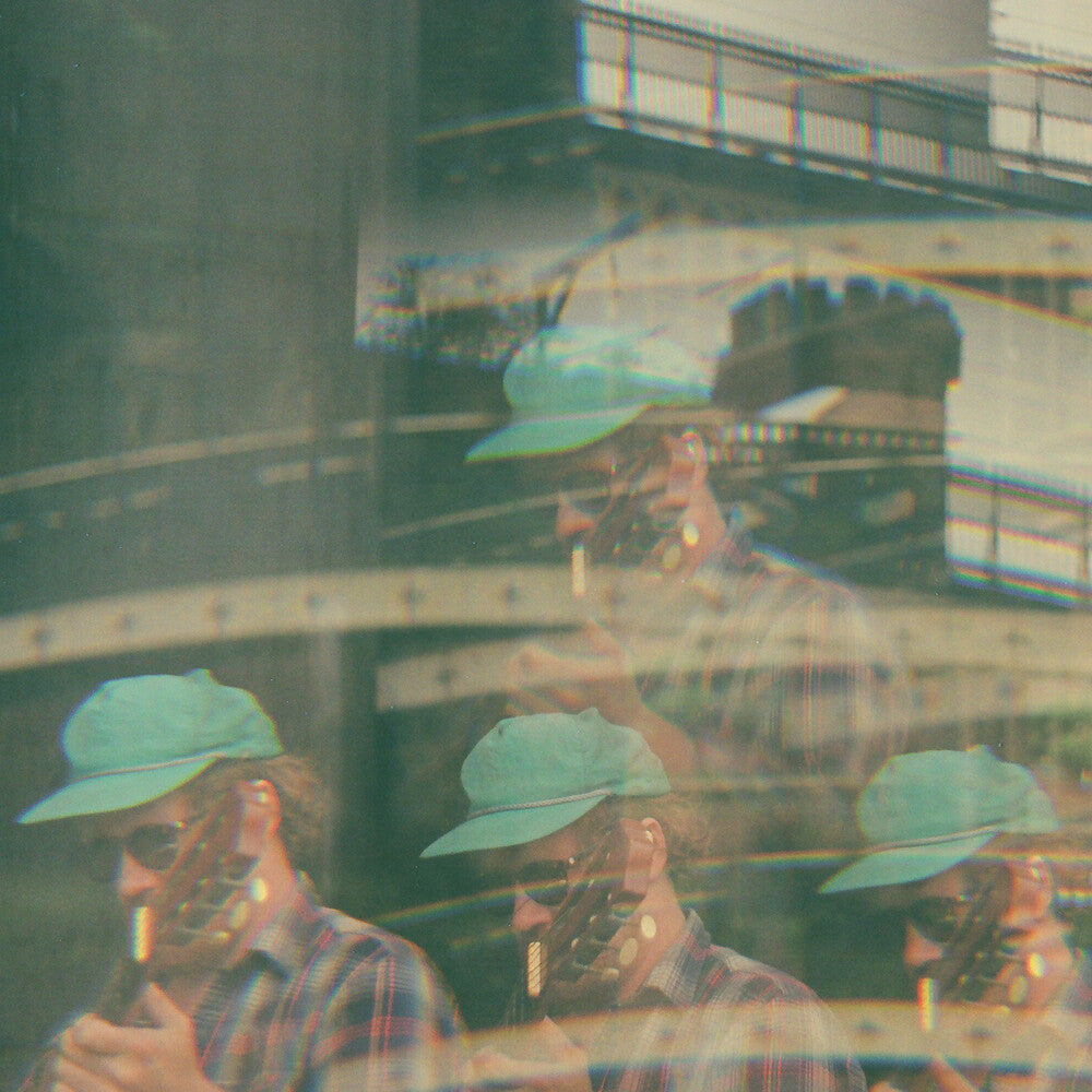 the album cover for Michael Nau - No Quit [Vinyl Single]