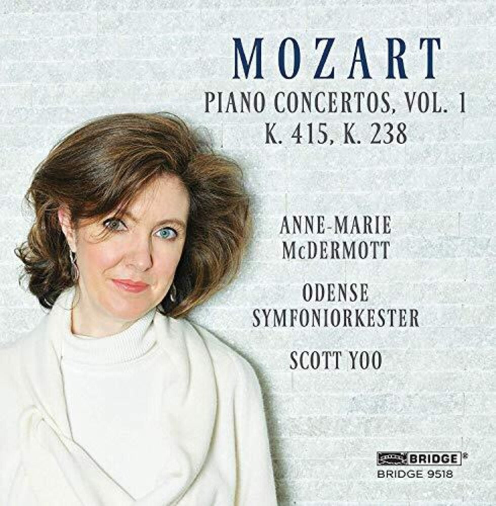 the album cover for Mozart / Mcdermott / Odense Symfoniorkester - Piano Concertos 1