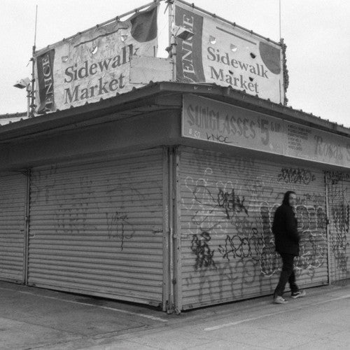 the album cover for Evidence - Weather Or Not