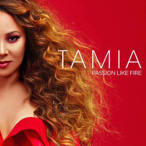 the album cover for Tamia - Passion Like Fire