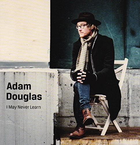 the album cover for Adam Douglas - I May Never Learn