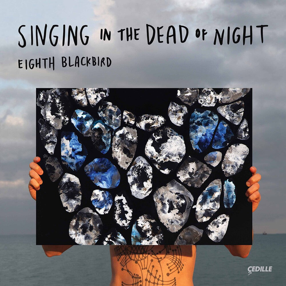 the album cover for Gordon / Eighth Blackbird - Singing in the Dead of Night