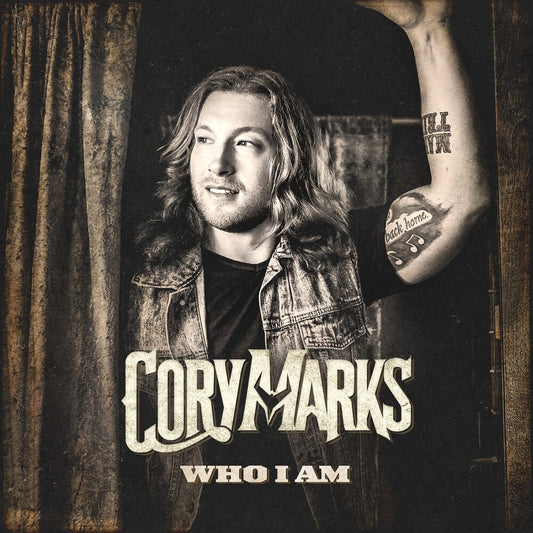 the album cover for Cory Marks - Who I Am