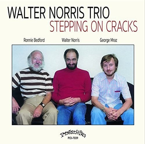 the album cover for Walter Norris - Stepping On Cracks