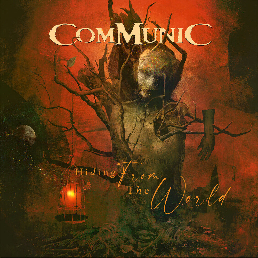 the album cover for Communic - Hiding From The World [Digipak]