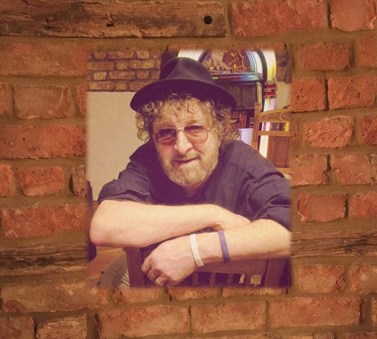 the album cover for Chas Hodges - Right At Home: Selected Unreleased Home Recordings