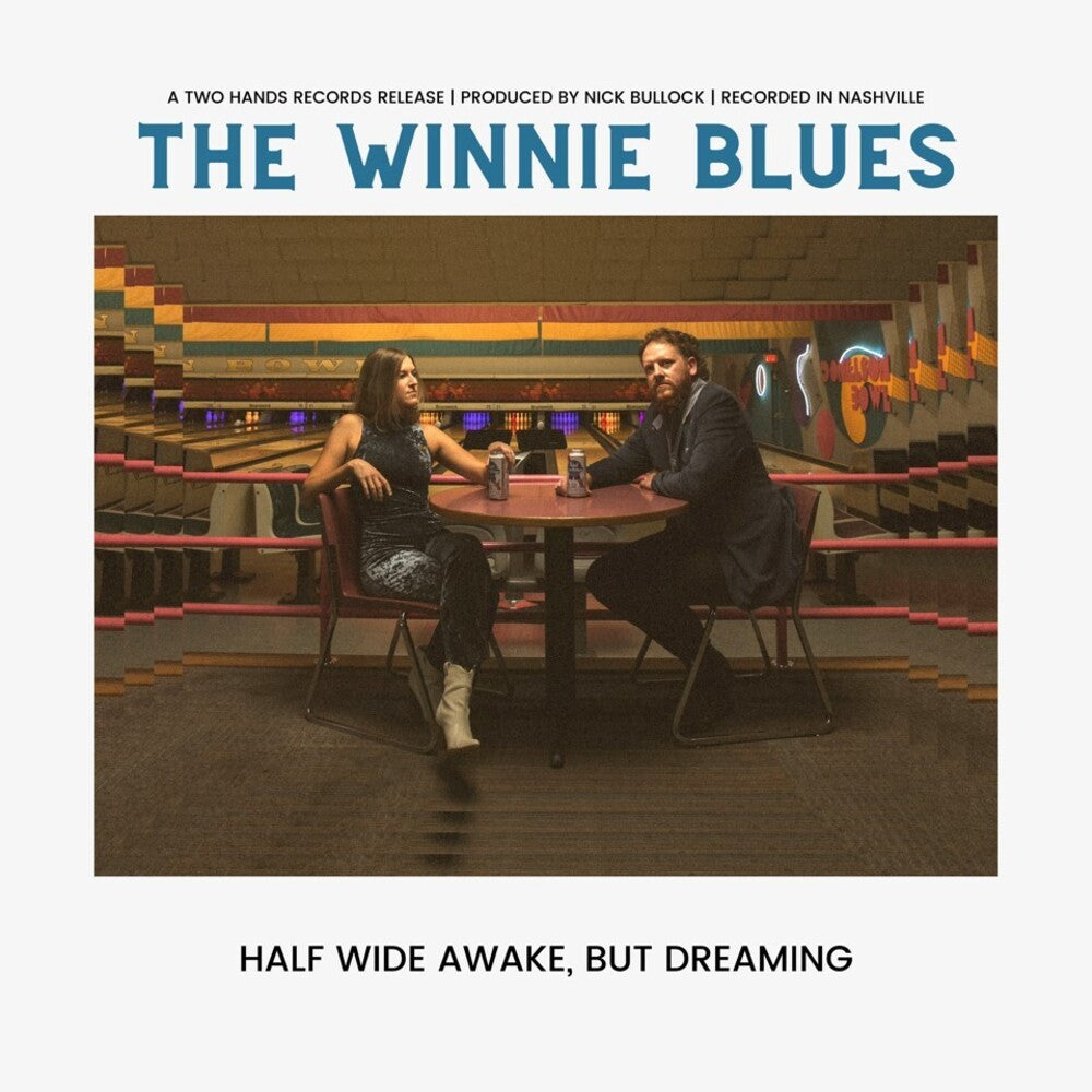 the album cover for Winnie Blues - Half Wide Awake But Dreaming