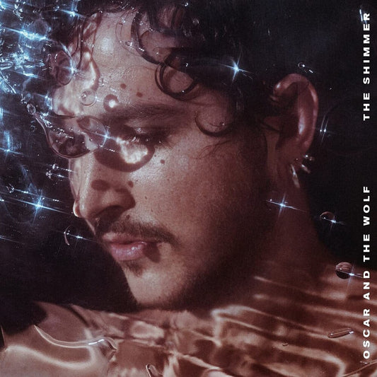 the album cover for Oscar And The Wolf - The Shimmer