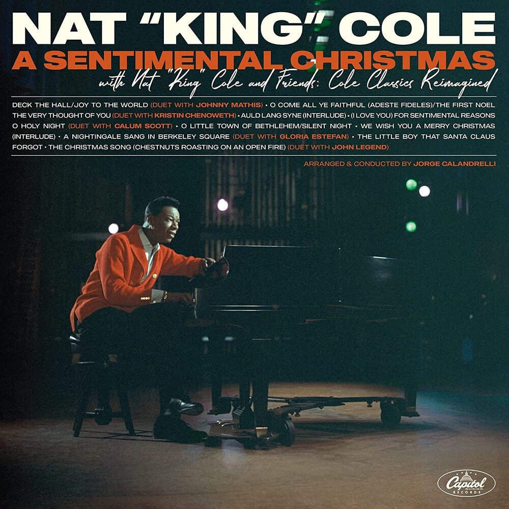 the album cover for Nat King Cole - A Sentimental Christmas With Nat King Cole And Friends: Cole Classics Reimagined