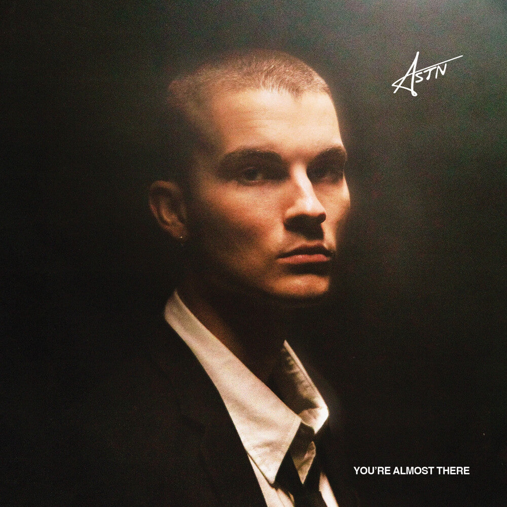 the album cover for Astn - You're Almost There