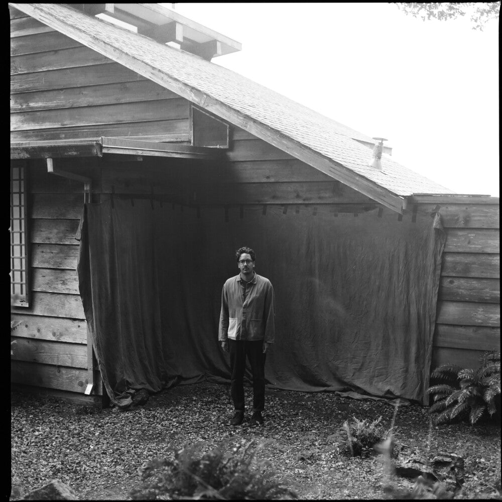 the album cover for Luke Sital-Singh - Dressing Like A Stranger