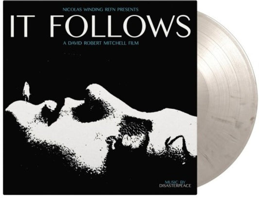 the album cover for Disasterpeace - It Follows (Original Soundtrack) - Limited 180-Gram Black & White Marble Colored Vinyl