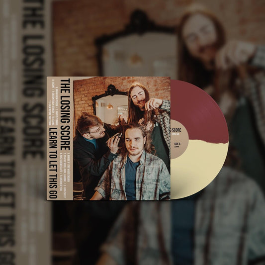 the album cover for Losing Score - Learn To Let This Go