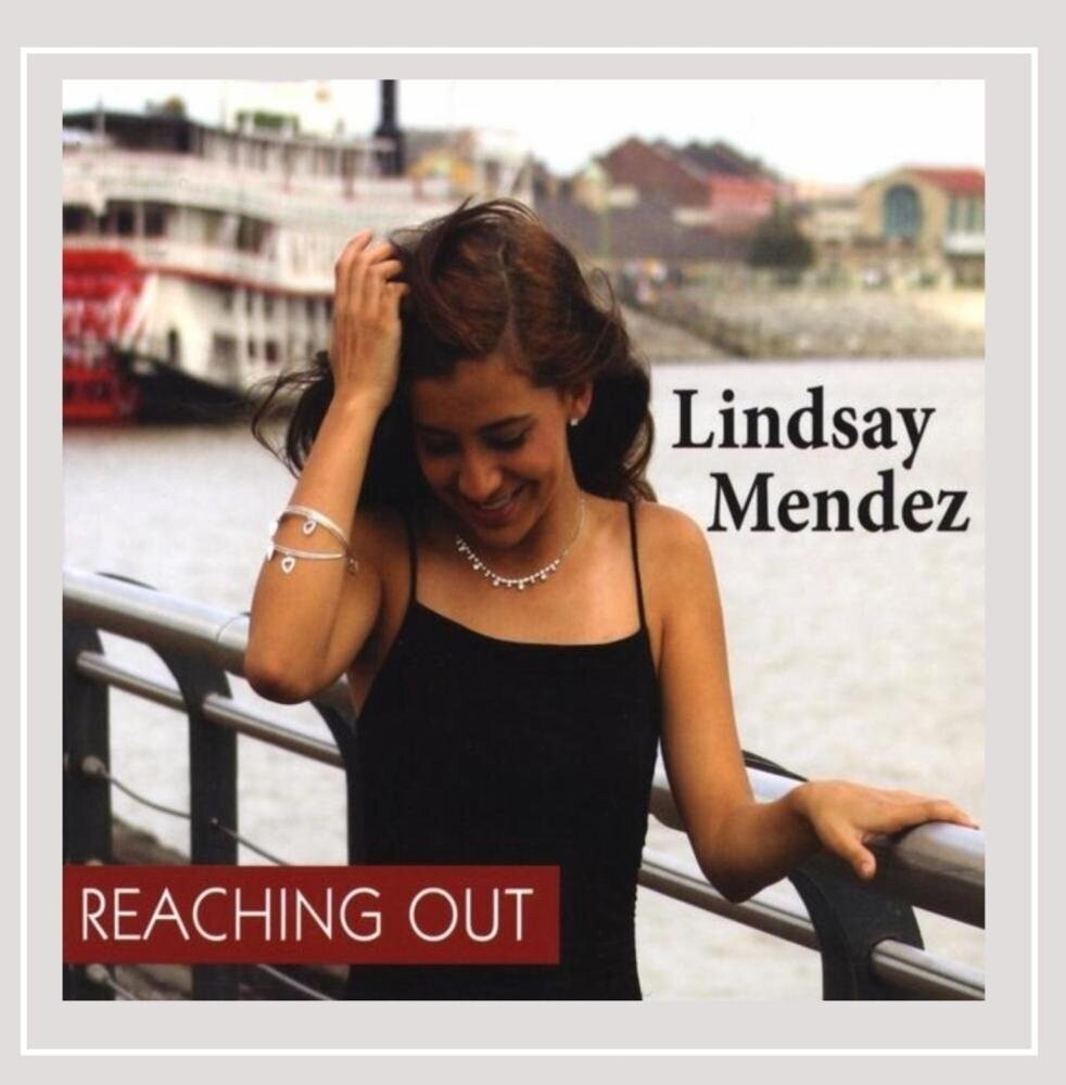 the album cover for Lindsay Mendez - Reaching Out
