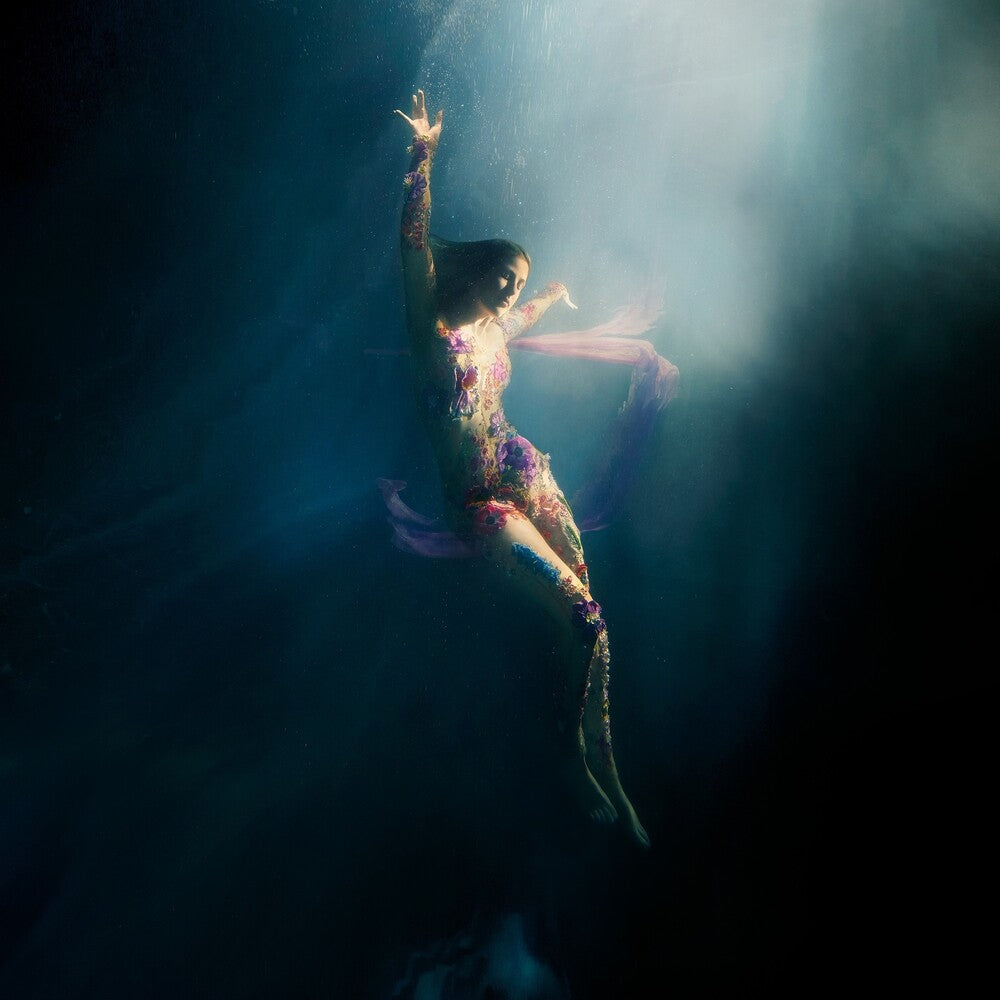 the album cover for Ellie Goulding - Higher Than Heaven [Deluxe CD]