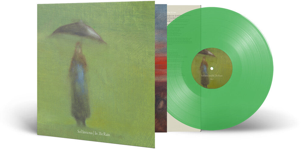the album cover for Sol Invictus - In The Rain - Light Green Transparent [Colored Vinyl] (Grn)