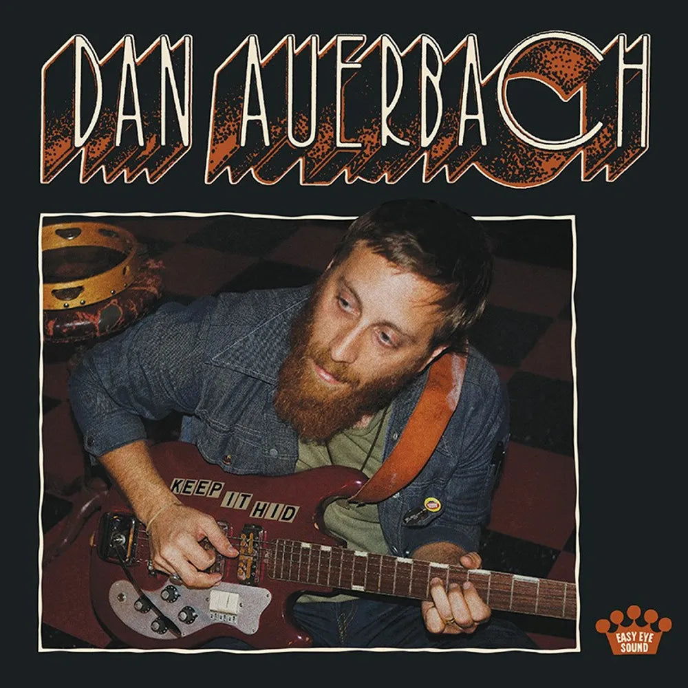 the album cover for Dan Auerbach - Keep It Hid [Indie Exclusive Limited Edition Tiger's Eye LP]