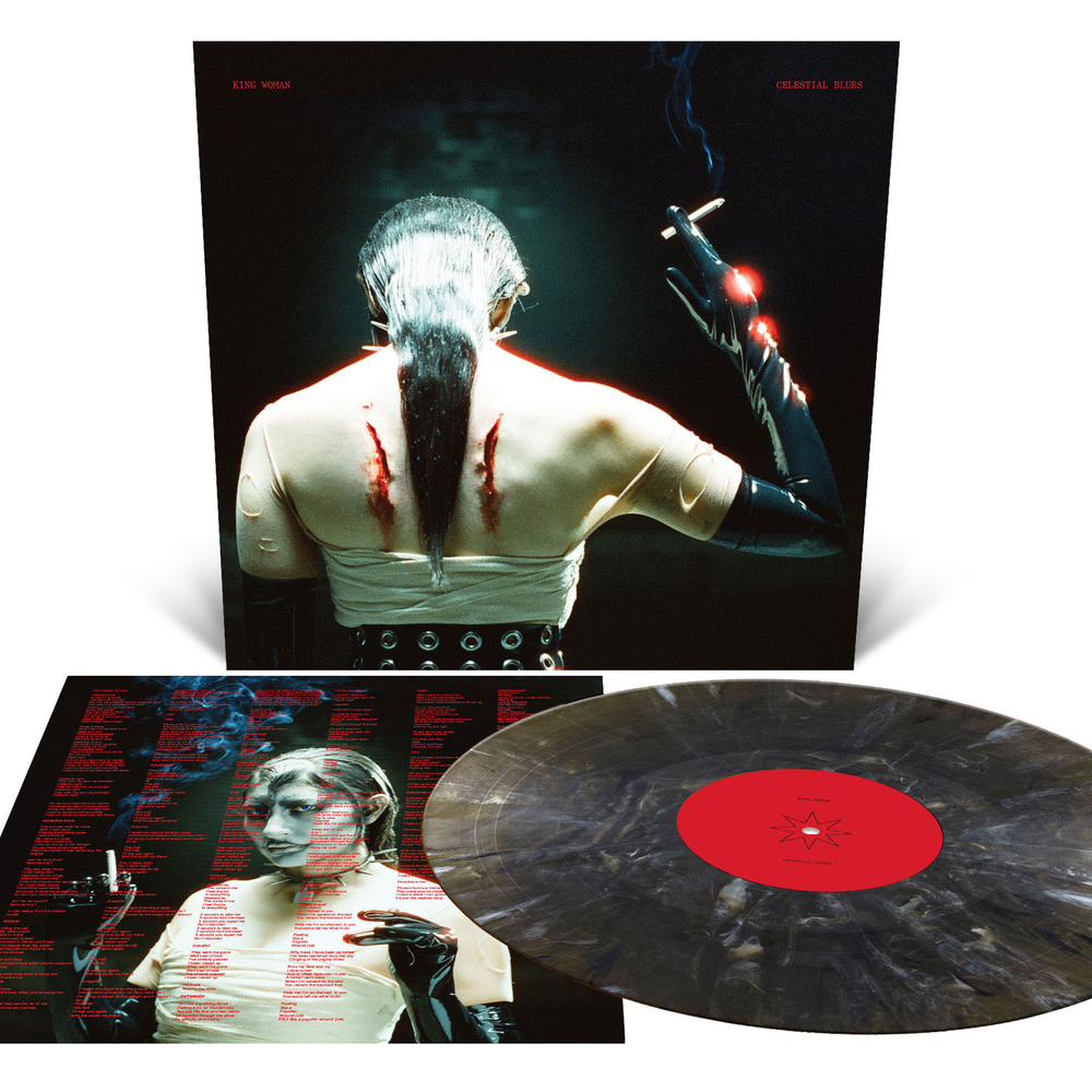 the album cover for King Woman - Celestial Blues [Black Onyx Marble]