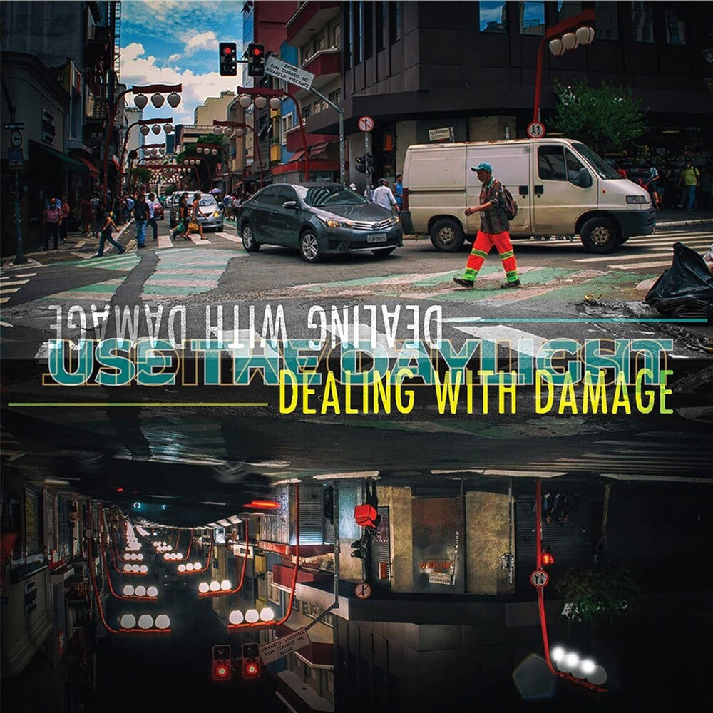 the album cover for Dealing With Damage - Use The Daylight