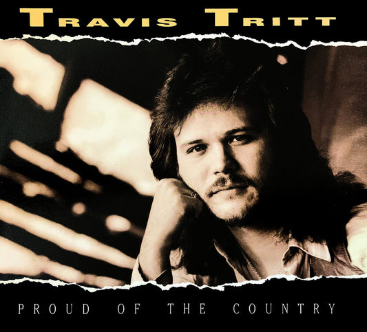 the album cover for Travis Tritt - Proud Of The Country