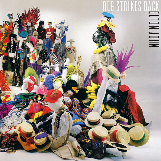the album cover for Elton John - Reg Strikes Back [Remastered LP]