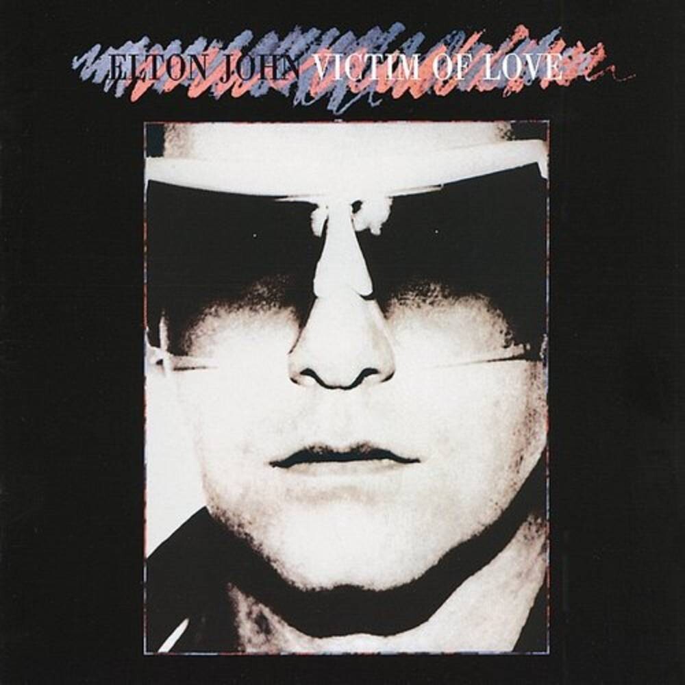 the album cover for Elton John - Victim Of Love [Remastered LP]