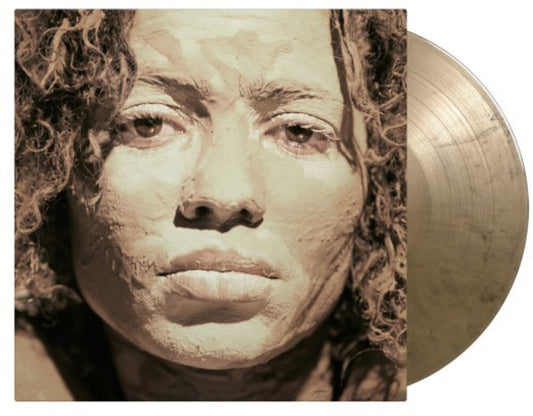 the album cover for Nneka - Soul Is Heavy (Blk) [Colored Vinyl] (Gate) (Gol) [Limited Edition]
