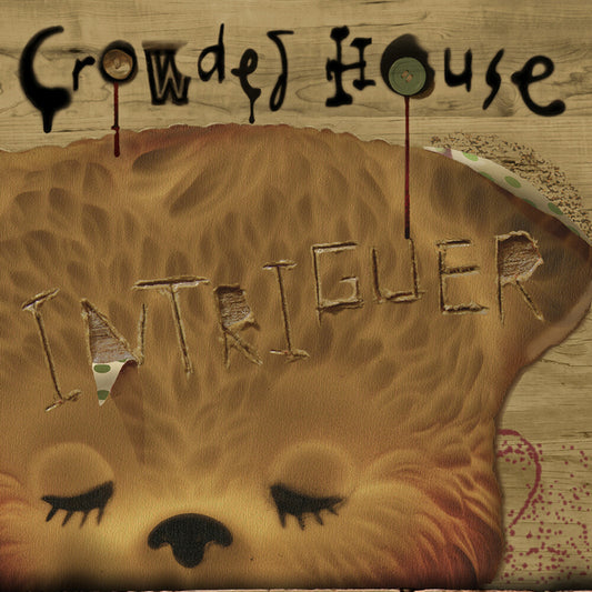 the album cover for Crowded House - Intriguer