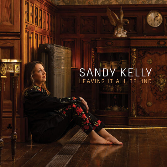 the album cover for Sandy Kelly - Leaving It All Behind (Uk)