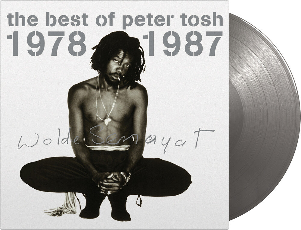 the album cover for Peter Tosh - Best Of 1978-1987 [Colored Vinyl] (Gate) [Limited Edition] [180 Gram] (Slv)