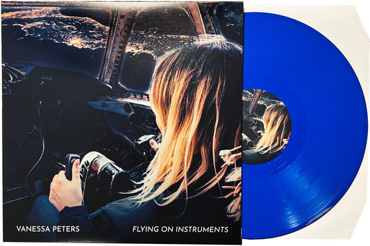 the album cover for Vanessa Peters - Flying On Instruments (Blue) [Colored Vinyl] (Gate) [Limited Edition]
