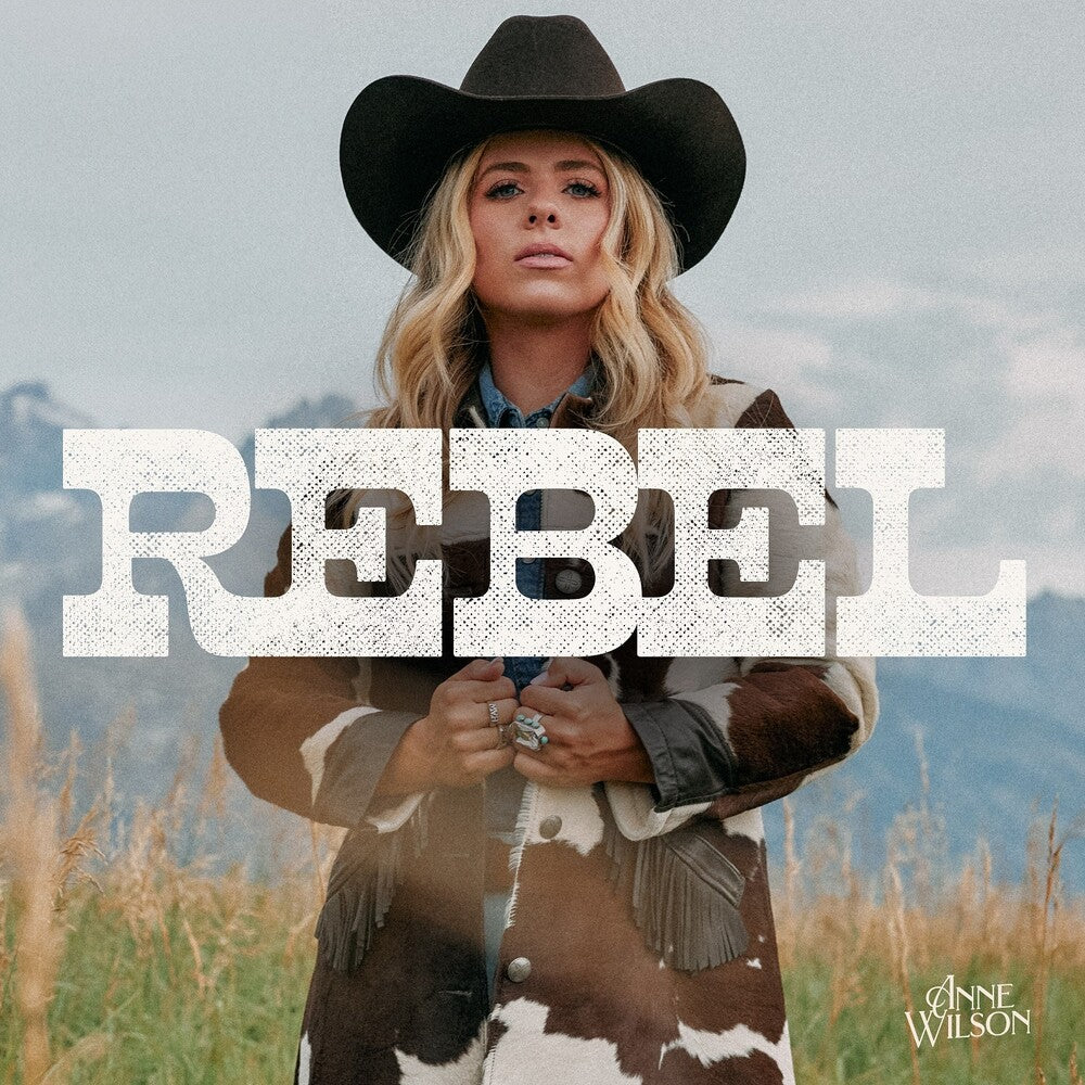 the album cover for Anne Wilson - Rebel [Tangerine Orange LP]