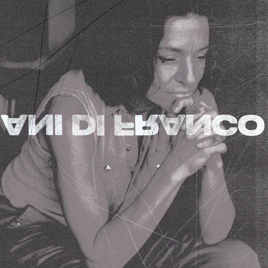 the album cover for ANI DIFRANCO	 - UNPRECEDENTED SH!T [BLACK LP]	