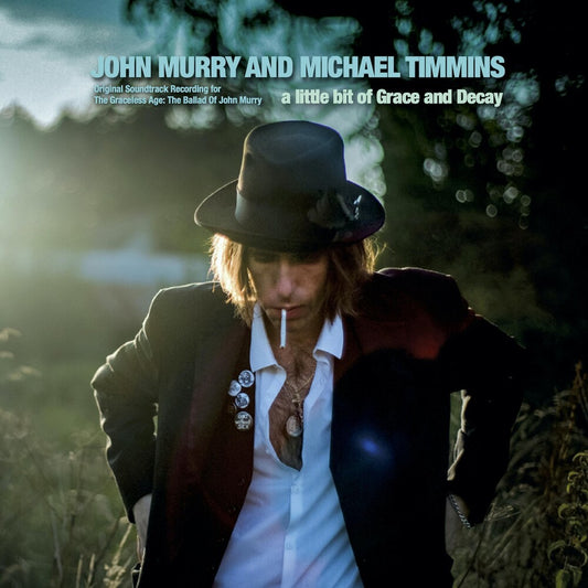 the album cover for John Murry  / Timmins,Michael - Little Bit Of Grace & Decay