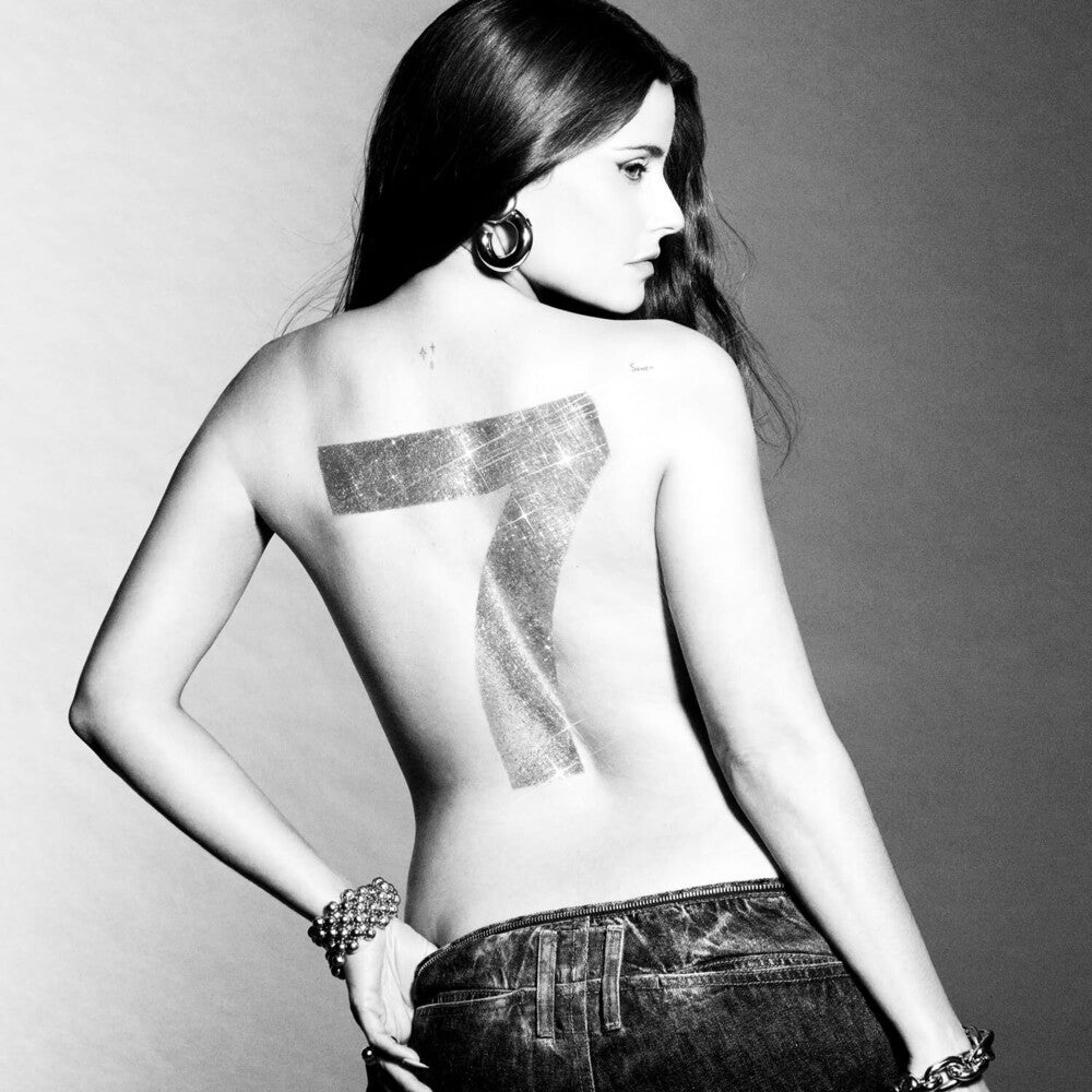 the album cover for Nelly Furtado - 7