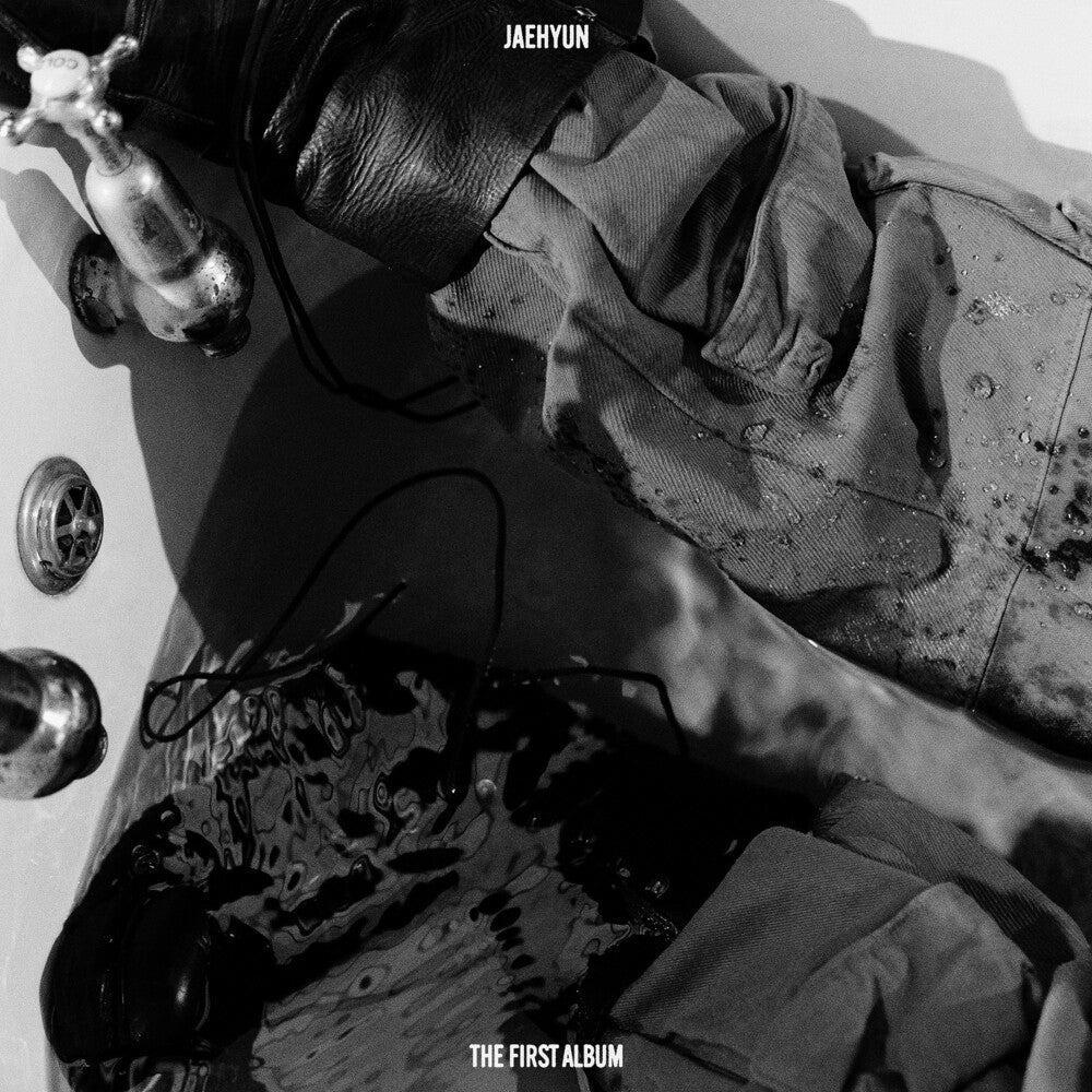 the album cover for Jaehyun - Jaehyun - The 1st Album 'j' [J Ver.] (Coas) (Post)