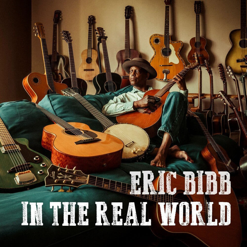 the album cover for Eric Bibb - In The Real World